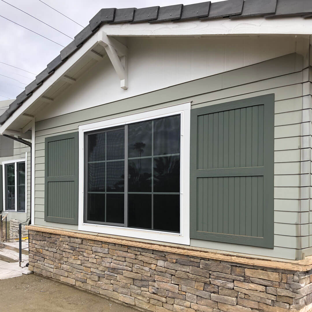 Solar window screens installed to prevent turf melting and glare